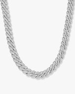 Silver braided necklace on a white background